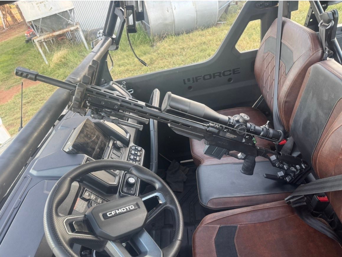Rifle stored inside UTV used for rural pest control operations